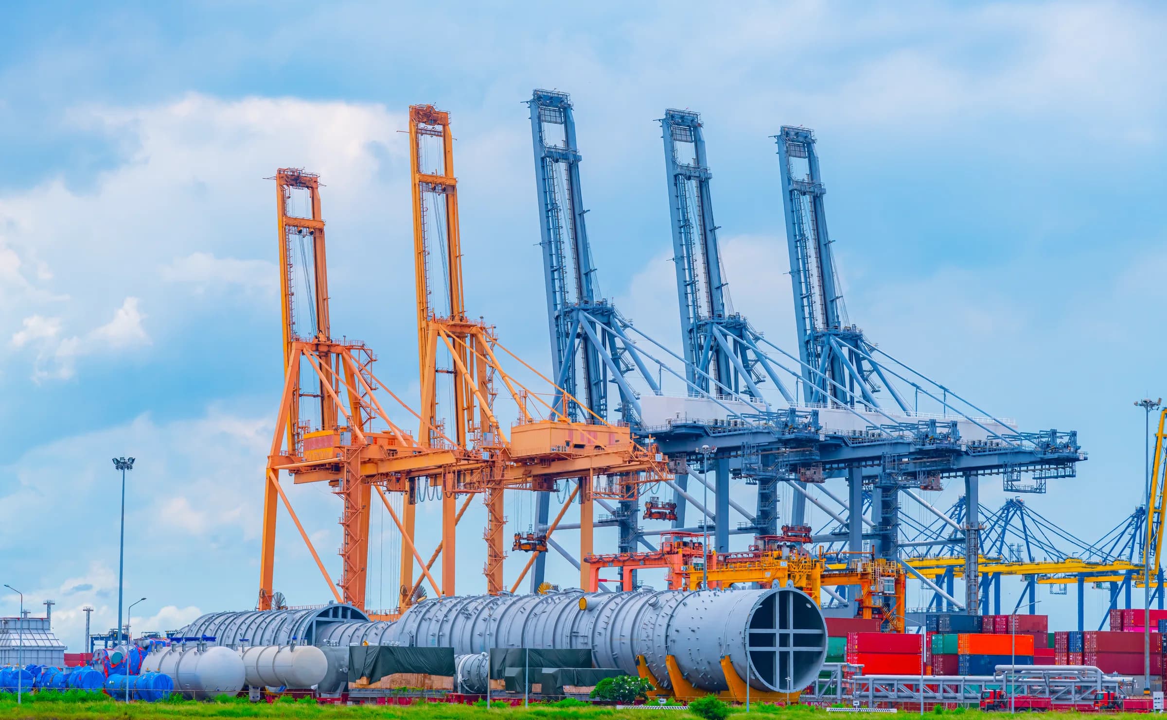 Cargo cranes and industrial equipment at a seaport terminal