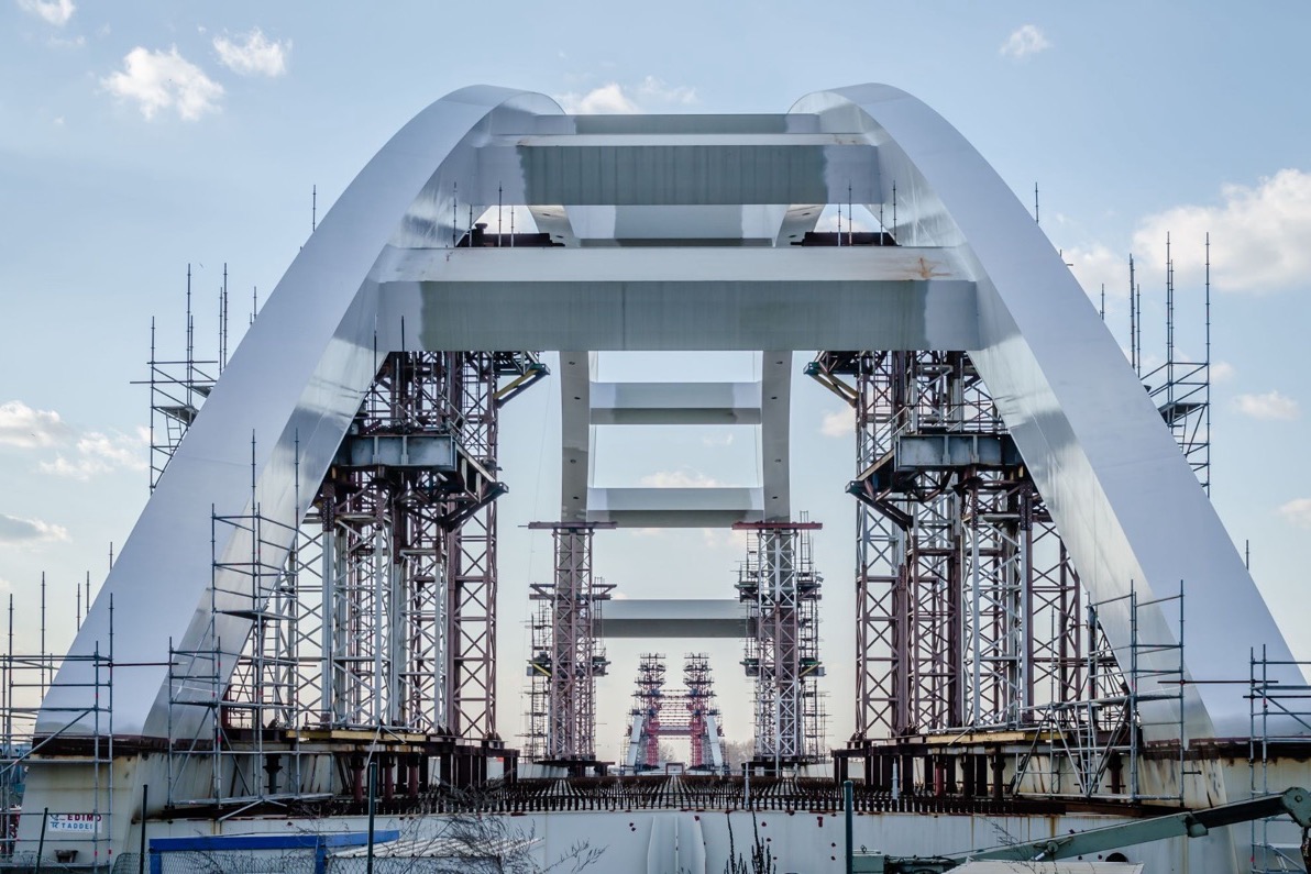Steel arch bridge under construction